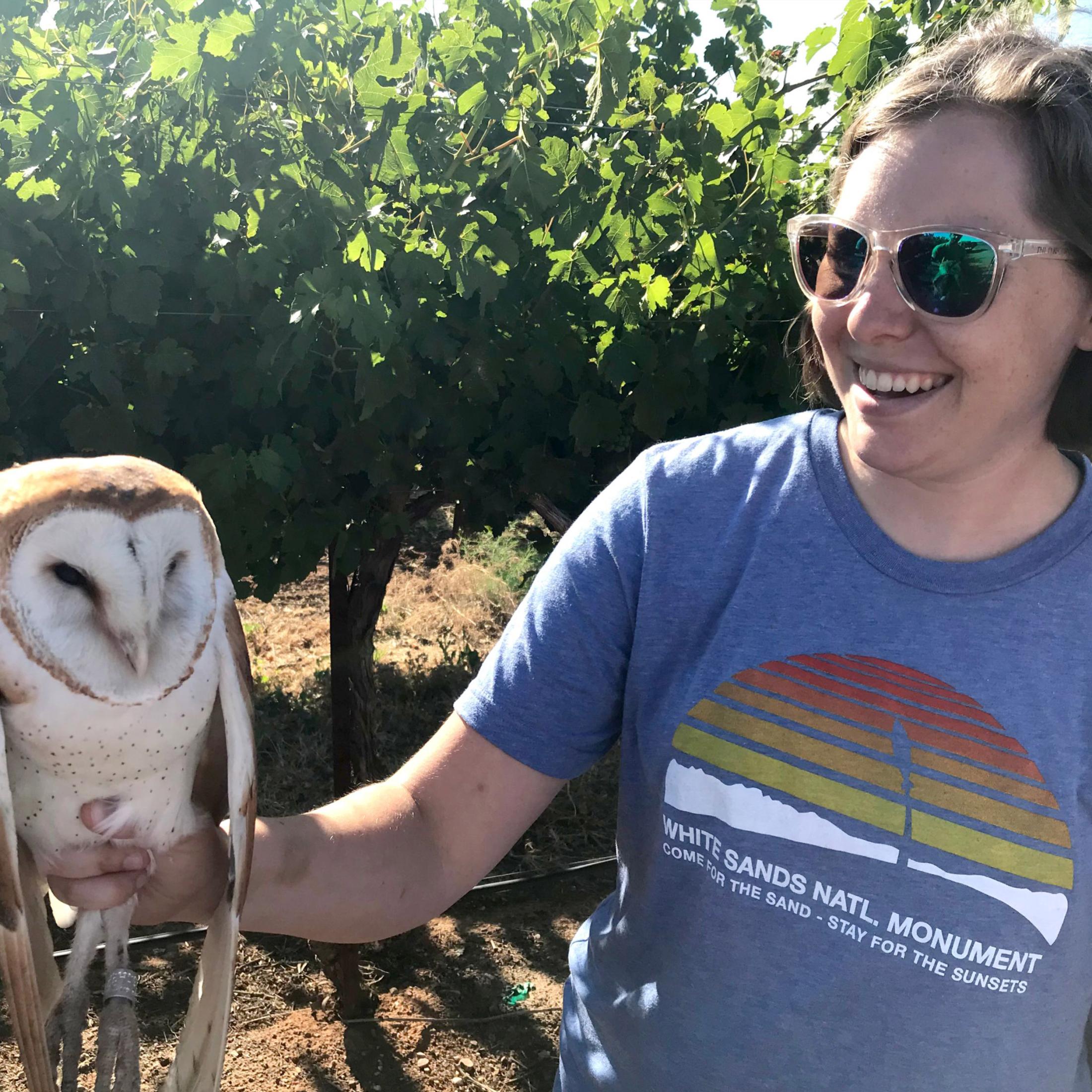 Emily Phillips holding barn owl