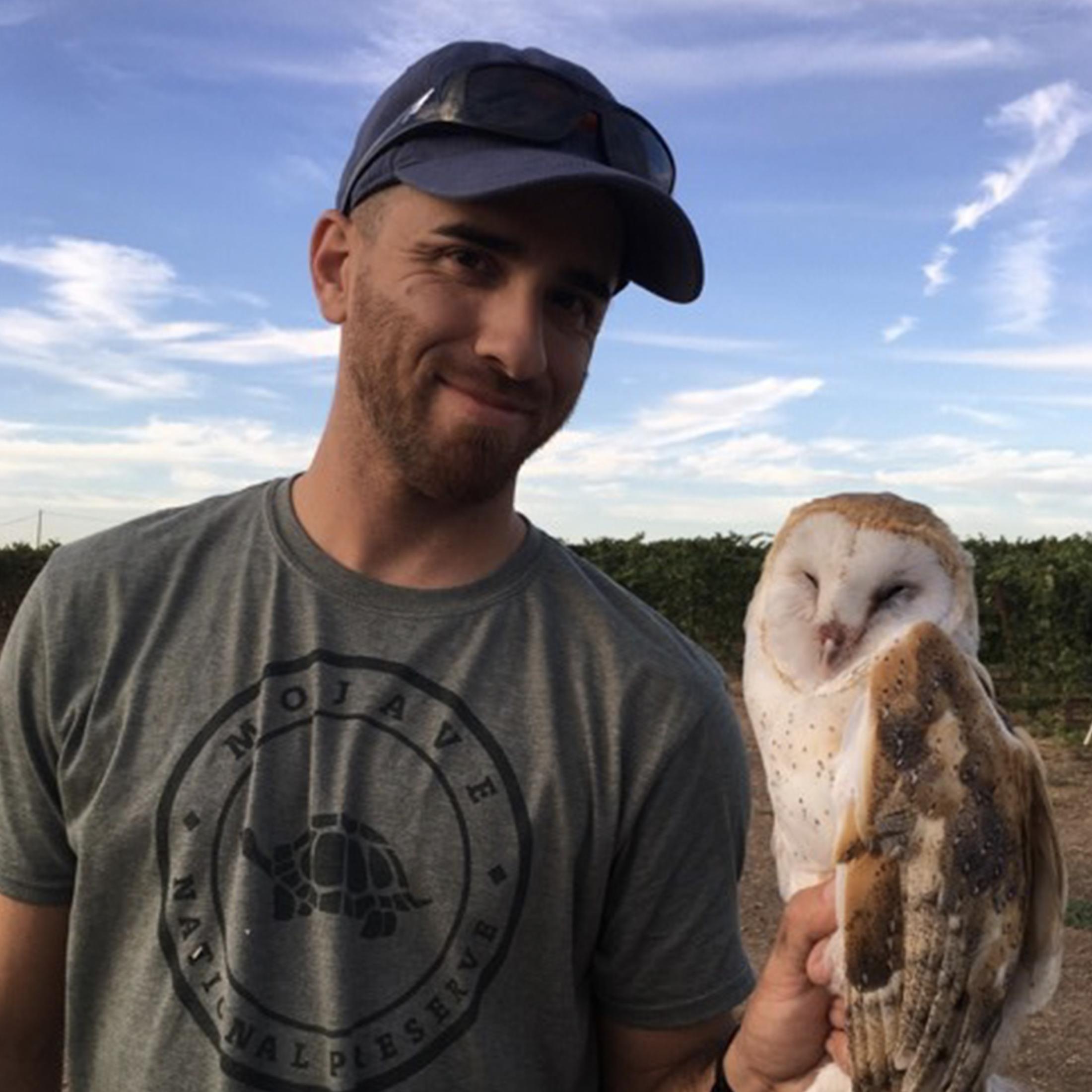 Ryan Bourbour with barn owl