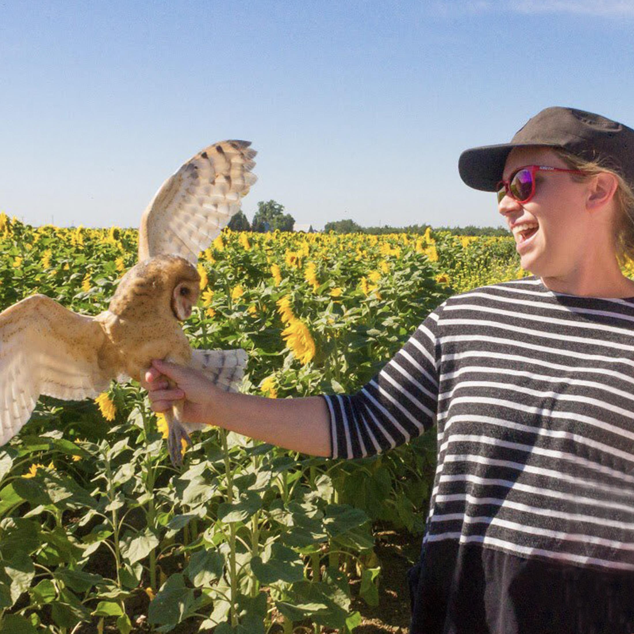 Sarah Kross holding barn owl